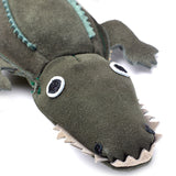 Eco-friendly dog toy shaped like a crocodile, made from soft suede and biodegradable jute fibre, perfect for sustainable pet play.
