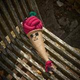 Eco-friendly ice cream cone dog toy featuring a jute cone, plaited jute rope scoop, and suede sunglasses, perfect for sustainable play.