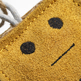 Eco-friendly cheese-shaped dog toy with a suede outer, natural jute stuffing, and jute rope legs, ideal for safe, sustainable play.