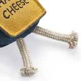 Eco-friendly cheese-shaped dog toy with a suede outer, natural jute stuffing, and jute rope legs, ideal for safe, sustainable play.