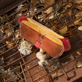 Eco-friendly dog toy shaped like a hot dog, made from suede and natural jute fibre with jute rope legs, perfect for safe and sustainable playtime.
