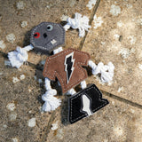 Eco-friendly robot-shaped dog toy made from natural jute and suede with jute rope arms and legs, perfect for safe and sustainable dog playtime.