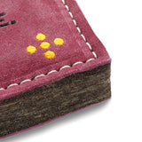 Eco-friendly dog toy made from natural jute and soft suede, shaped for chewing and play. Tough, sustainable, and safe for your dog.