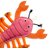 Eco-friendly lobster-shaped dog toy made from natural suede, jute fibre stuffing, and plaited jute rope legs. Perfect for chewing and tugging.
