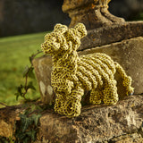 Eco-friendly dog toy shaped like a llama, made from knotted jute rope over a recycled bottle. Durable, safe, and perfect for chewing or playing.