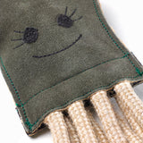 Eco-friendly Olive the Octopus dog toy, made with sustainable jute, soft suede, and a crinkler bottle for added fun.