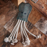 Eco-friendly Olive the Octopus dog toy, made with sustainable jute, soft suede, and a crinkler bottle for added fun.