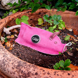 Eco-friendly Peggy the Pig dog toy, made from sustainable jute, suede, and a recycled crinkle bottle for safe, fun playtime.