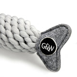 Eco-friendly Roger the Ropefish dog toy with a felt head, jute rope body, and crinkly recycled bottle inside for interactive fun.