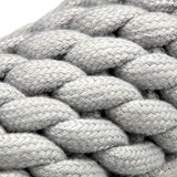 Eco-friendly Roger the Ropefish dog toy with a felt head, jute rope body, and crinkly recycled bottle inside for interactive fun.