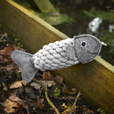 Eco-friendly Roger the Ropefish dog toy with a felt head, jute rope body, and crinkly recycled bottle inside for interactive fun.