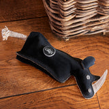 Eco-friendly Ronnie the Rhino dog toy made from jute, recycled cotton, and suede, with a crinkly bottle inside for interactive play.
