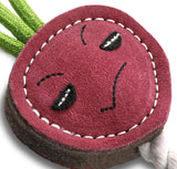 Ruby the Radish eco-friendly dog toy made from suede, natural jute fibre, and durable jute rope for interactive play.