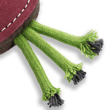 Ruby the Radish eco-friendly dog toy made from suede, natural jute fibre, and durable jute rope for interactive play.