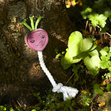 Ruby the Radish eco-friendly dog toy made from suede, natural jute fibre, and durable jute rope for interactive play.
