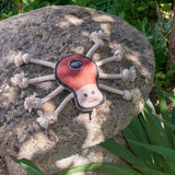 Spike the Spider eco-friendly dog toy made from soft suede and natural jute fibre, featuring eight sturdy rope legs for interactive play.