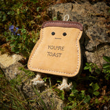 Green & Wilds You’re Toast Eco Dog Toy – fun toast-shaped natural jute and suede dog toy with plaited rope legs.