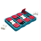 Nina Ottosson Dog Brick Puzzle – Level 2 interactive dog toy with treat-hiding flip lids, sliding panels, and removable bone covers.