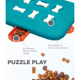 Nina Ottosson Dog Casino Puzzle – Advanced Level 3 treat-dispensing dog toy with twist-lock bones and hidden treat drawers.