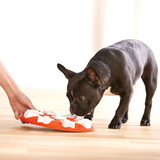 Nina Ottosson Dog Smart Puzzle Toy – Level 1 interactive dog puzzle with 9 treat compartments and removable bone covers for mental stimulation.