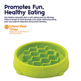 Bright green Nina Ottosson Kitty Slow Feeder with maze design and a slip-resistant base for cats eating wet or dry food.