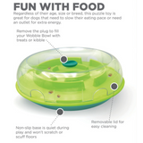 Nina Ottosson Wobble Bowl treat puzzle toy with kibble dispensing as a dog wobbles the bowl.