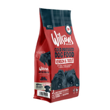 A bag of Wilson's Premium British Cold Pressed Dog Food with Venison & Trout. The packaging is predominantly red and white, with an image of a black dog, and product details including 10% less salt for kidney health.
