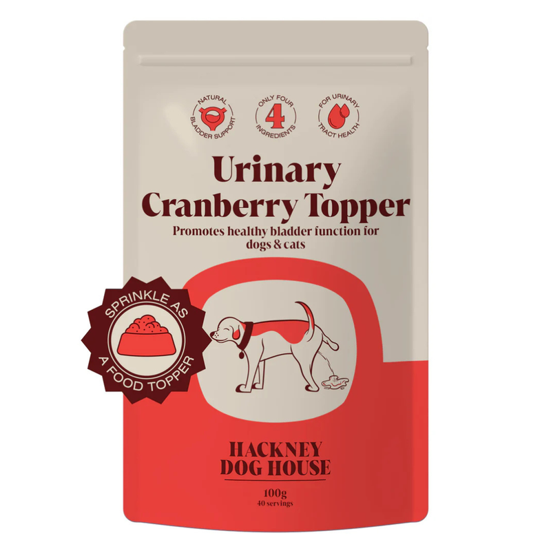 Packet of Hackney Dog House Urinary Cranberry Topper for dogs and cats on a white background