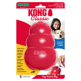 Red KONG Classic dog toy with a hollow centre for stuffing treats, made from durable rubber.