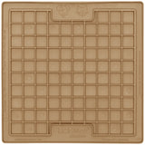 A beige LickiMat Playdate dog and cat treat dispenser with a grid of small compartments.