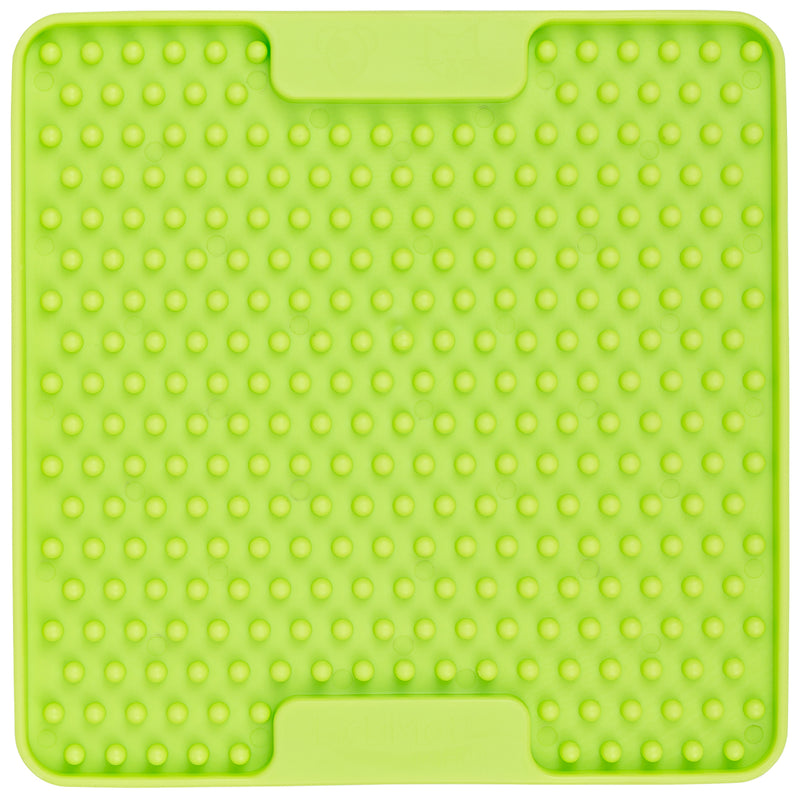 A green LickiMat Soother Mini Cat slow feeding mat for cats with a textured surface designed to slow down feeding.