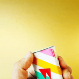 W'zis Tin with the lid being popped animation